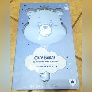 Impressions Vanity x Care Bears Grumpy Bear LED Handheld Makeup Mirror